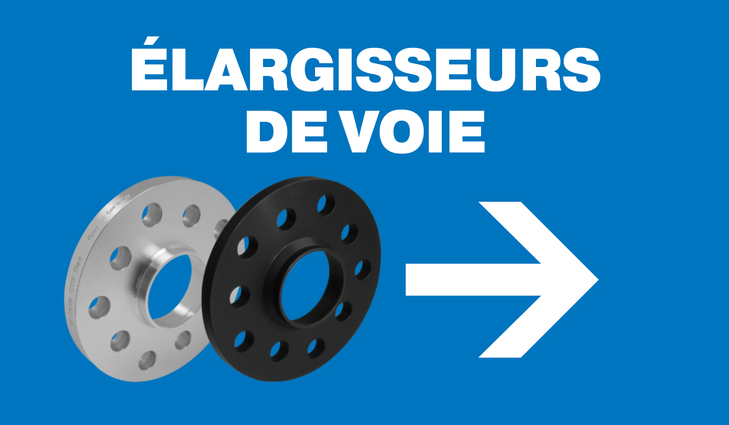 Blaues Banner mit weißer Aufschrift „Spurverbreiterung nach Fahrzeug“.